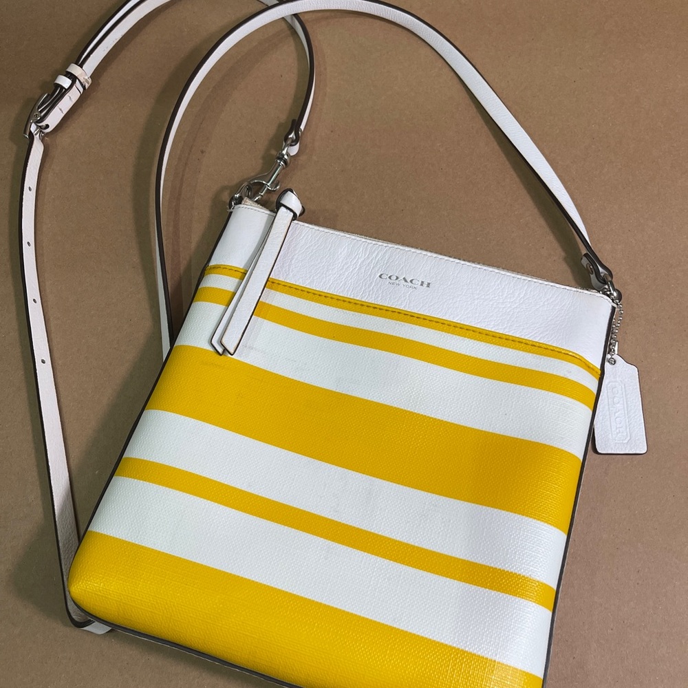 Coach yellow and white striped small crossbody.